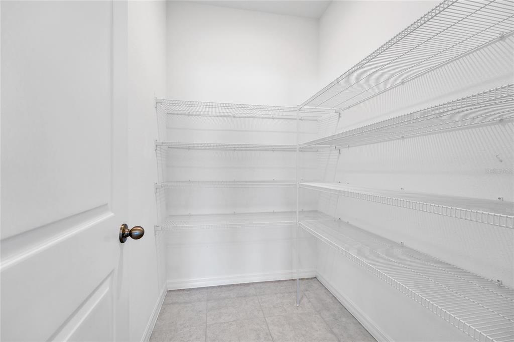 5875 Herder Road St. Cloud, FL 34771 - Photo 10 of 42 a view of a room with shelf