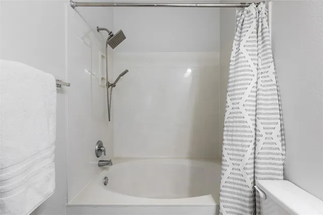 a close up of a bathtub in a bathroom