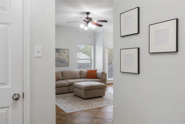a living room with furniture and a window