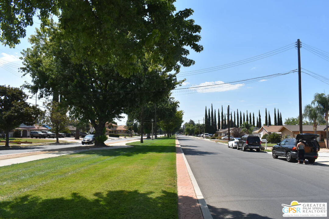 1385 Palm Avenue Beaumont, CA 92223 - Photo 2 of 13 a view of a park with swings and slides