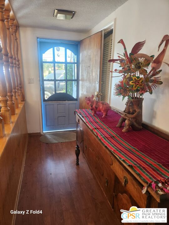 1385 Palm Avenue Beaumont, CA 92223 - Photo 6 of 13 a living room with furniture and a potted plant