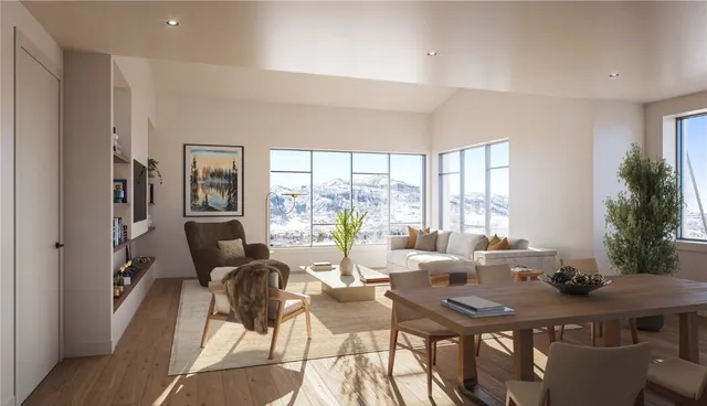 a room with furniture and a large window