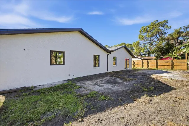 a view of a backyard with a garden