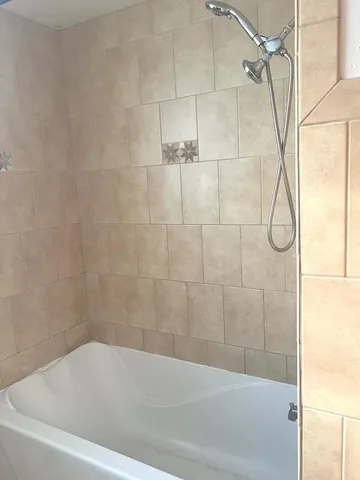 a bathroom with a bathtub