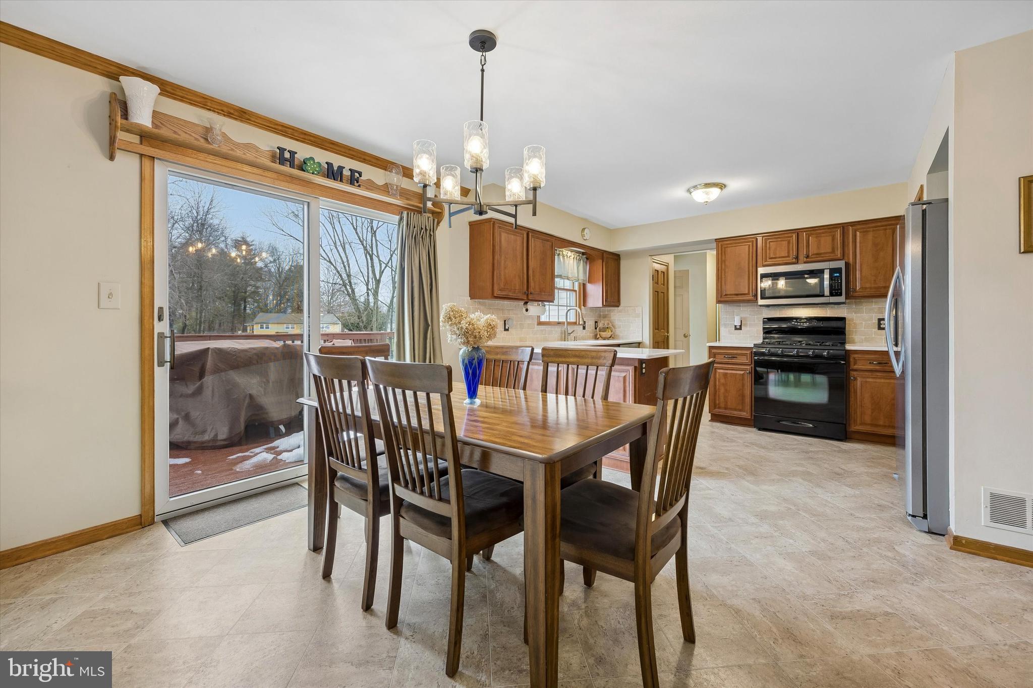3 Valli Court Hamilton, NJ 08690 - Photo 13 of 48 a dining room with furniture a chandelier and kitchen view
