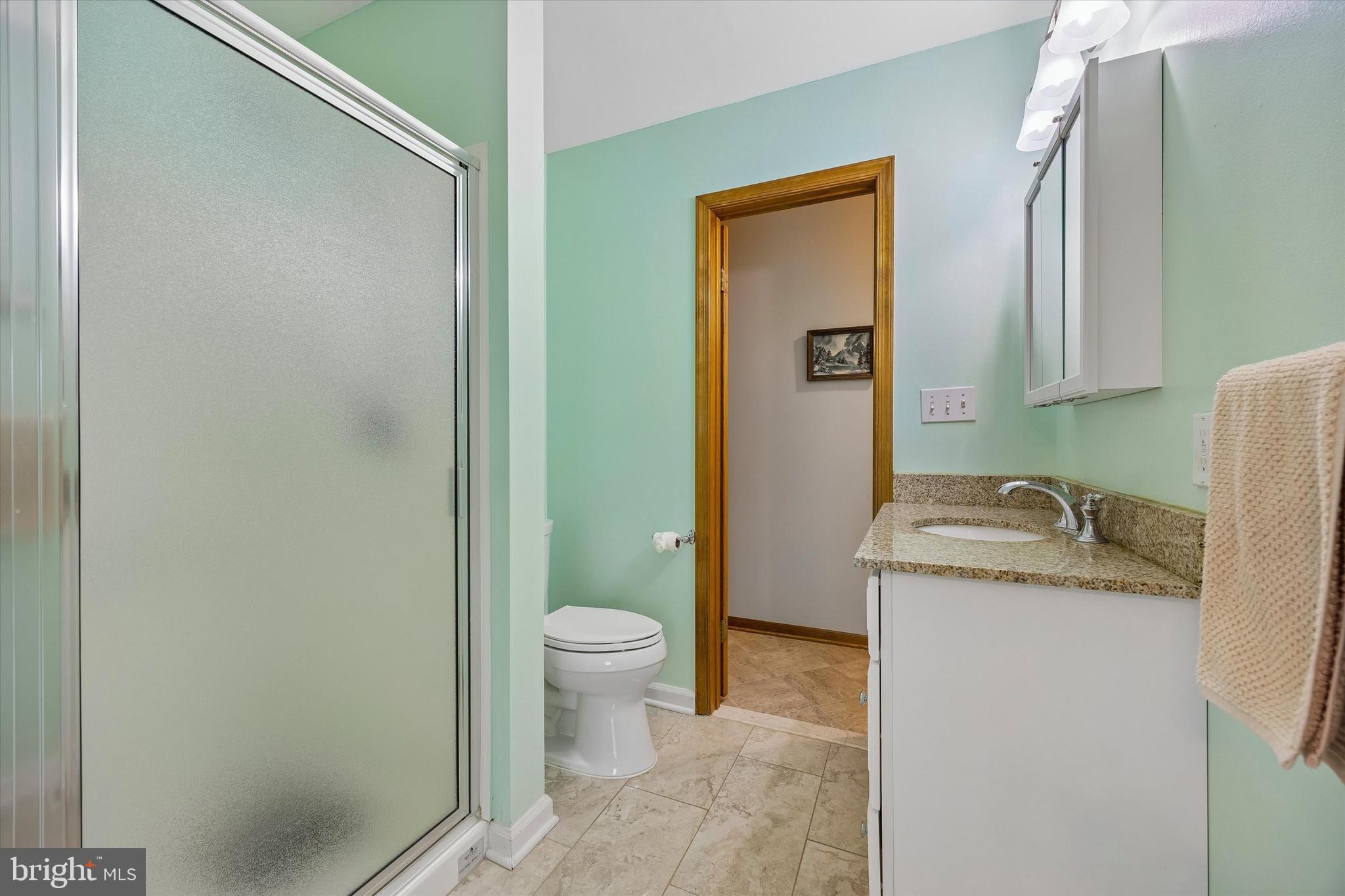 3 Valli Court Hamilton, NJ 08690 - Photo 21 of 48 a bathroom with a granite countertop sink and a toilet