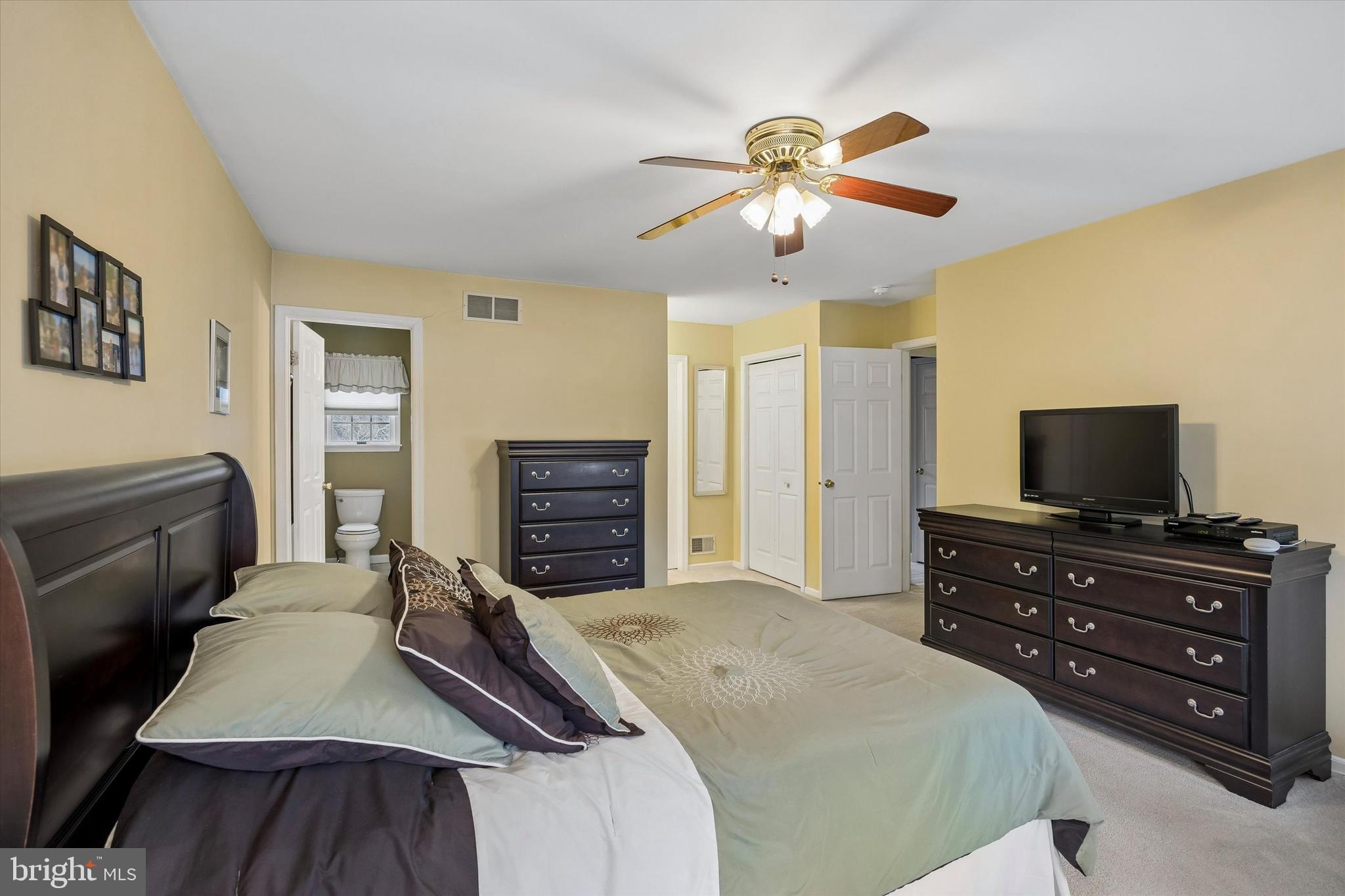 3 Valli Court Hamilton, NJ 08690 - Photo 33 of 48 a bedroom with a bed and a flat screen tv