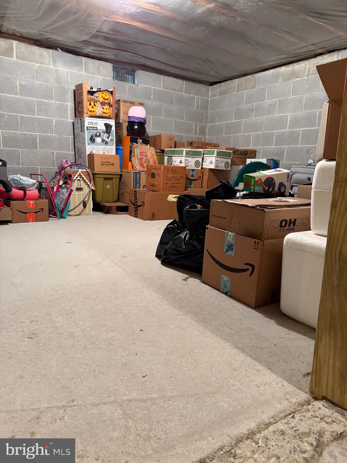 3 Valli Court Hamilton, NJ 08690 - Photo 43 of 48 a garage with furniture a window and a table