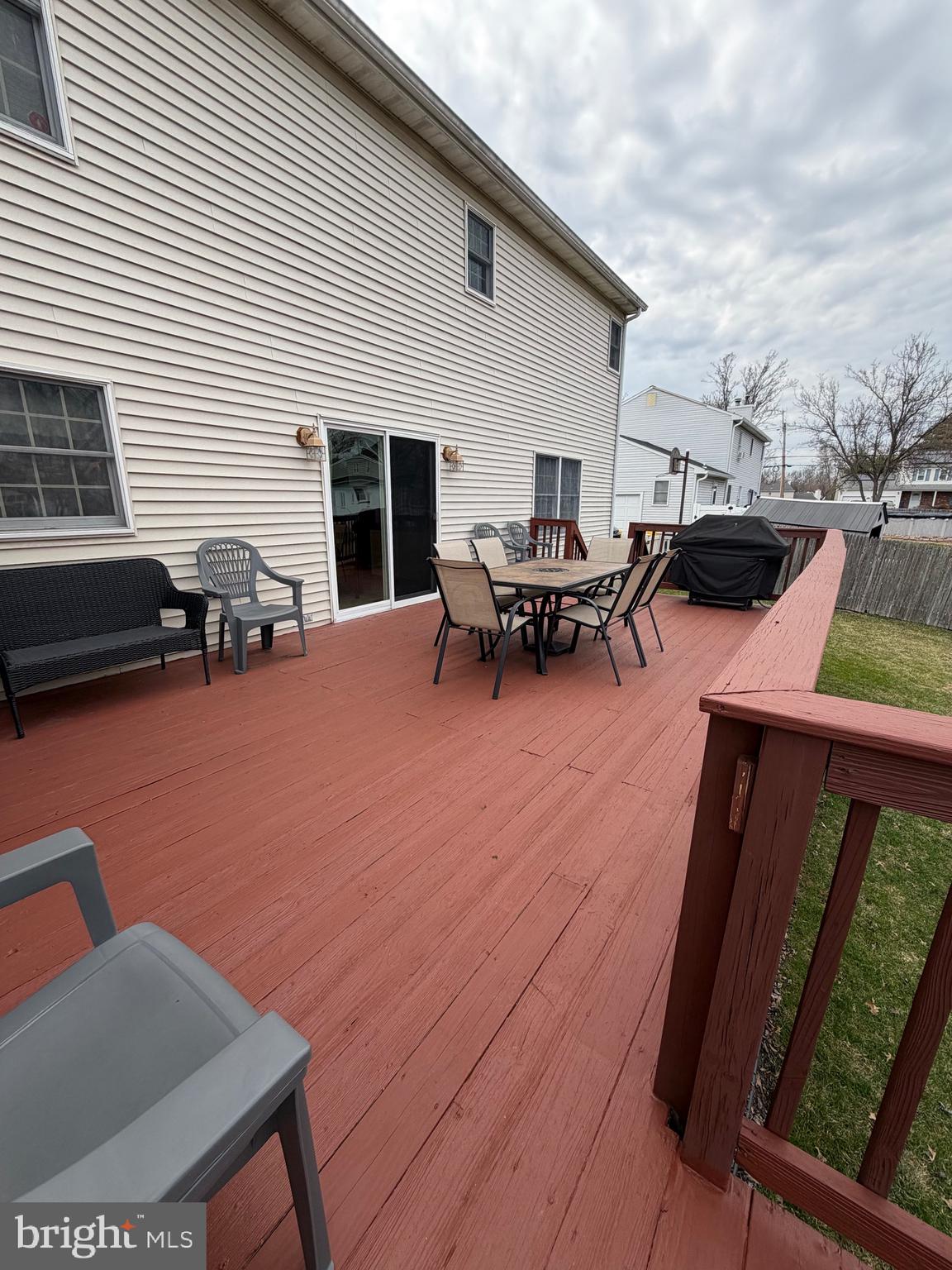 3 Valli Court Hamilton, NJ 08690 - Photo 47 of 48 a view of a patio with table and chairs and wooden floor