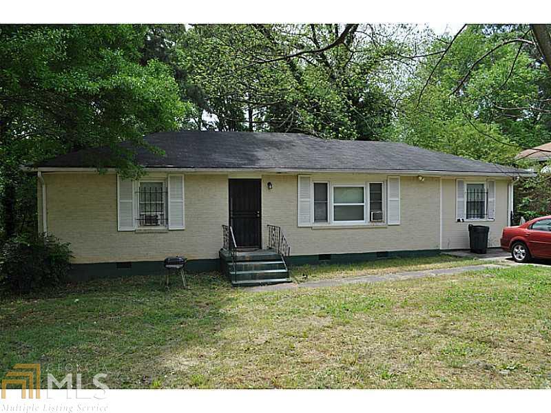 2507 Brentwood Road, Unit 11 Decatur, GA 30032 - Photo 1 of 1 a view of a backyard with a garden