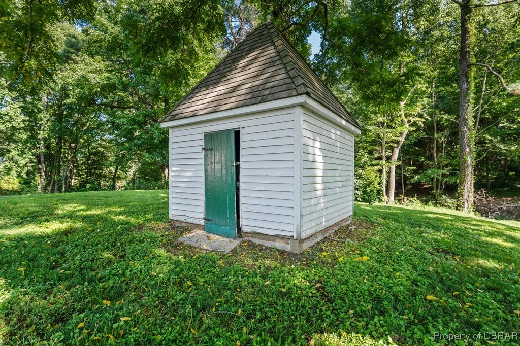 1701 Balls Neck Road Kilmarnock, VA 22482 - Photo 49 of 50 View of outdoor structure featuring a lawn