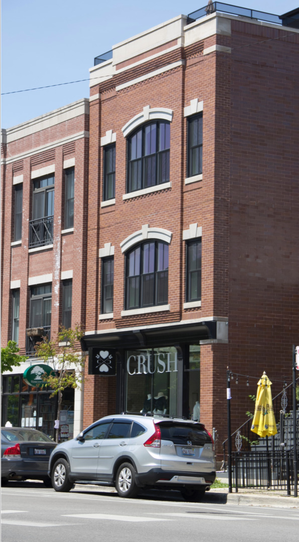 a car parked in front of a building