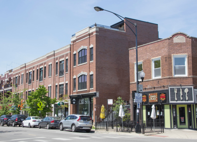2138 West Roscoe Street Chicago, IL 60618 - Photo 6 of 7 a view of a building and a street