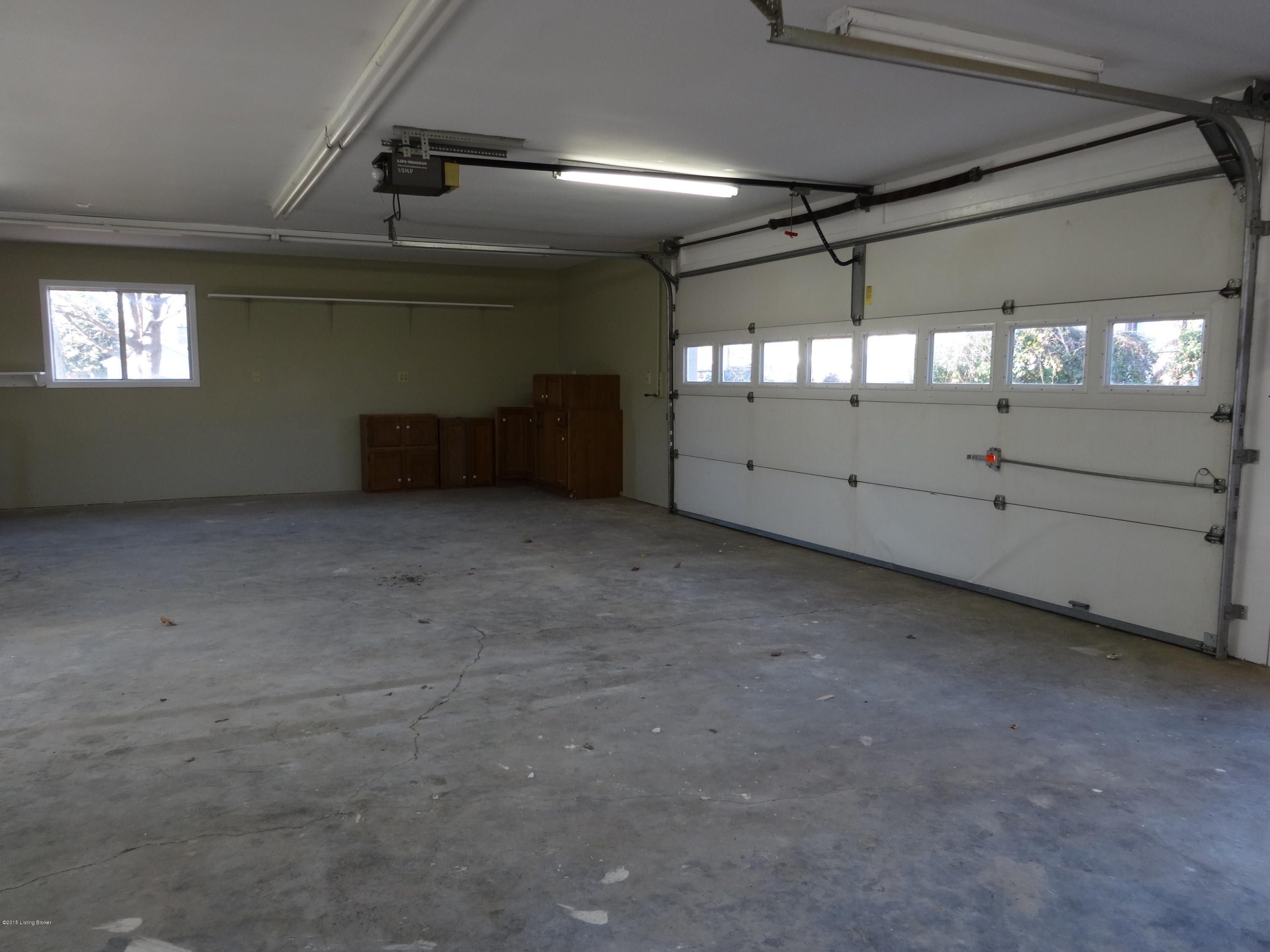 4402 Lowe Road Louisville, KY 40220 - Photo 20 of 44 Huge 3.5 Car Garage w/ work room!