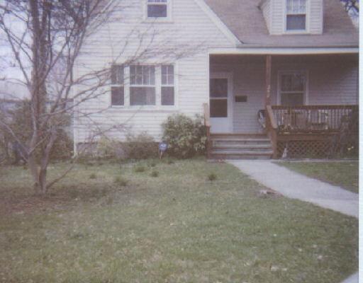 242 Lake Street Bridgeport, CT 06606 - Photo 1 of 1 a view of a brick house with many windows