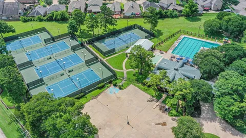 a picture of a bathroom with a shower