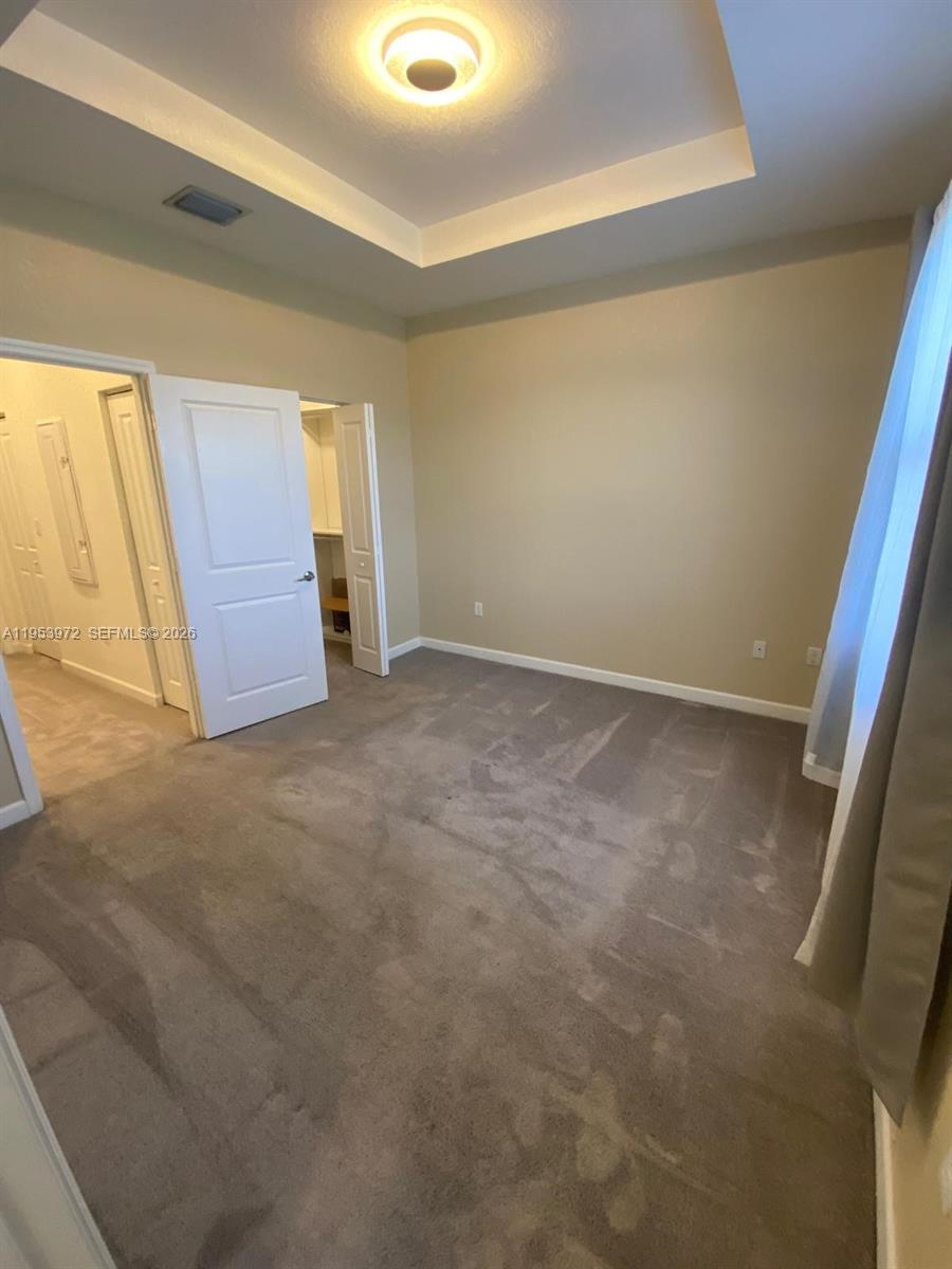 18220 Southwest 148th Road Miami, FL 33187 - Photo 11 of 23 a view of an empty room