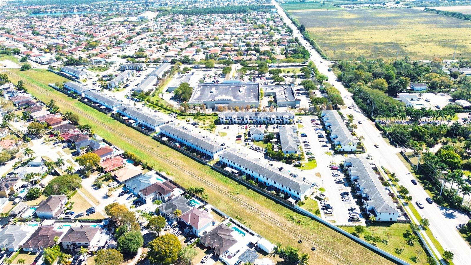 18220 Southwest 148th Road Miami, FL 33187 - Photo 22 of 23 an aerial view of a city