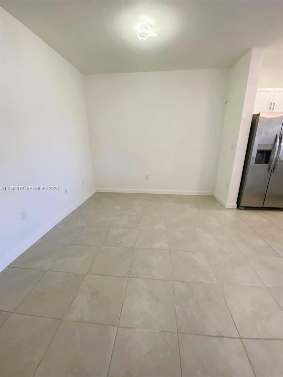 18220 Southwest 148th Road Miami, FL 33187 - Photo 5 of 23 a view of a room with a sink