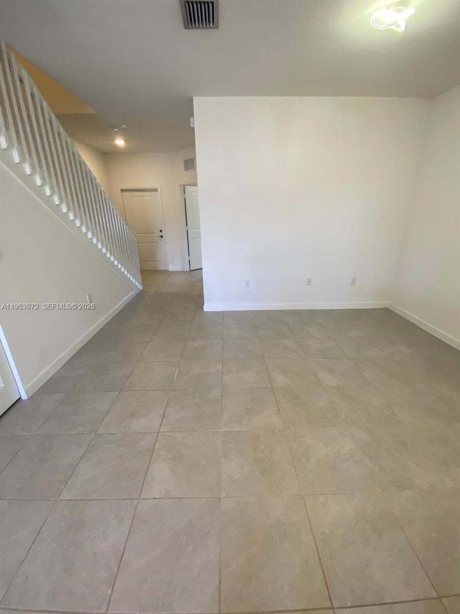 18220 Southwest 148th Road Miami, FL 33187 - Photo 6 of 23 a view of an empty room