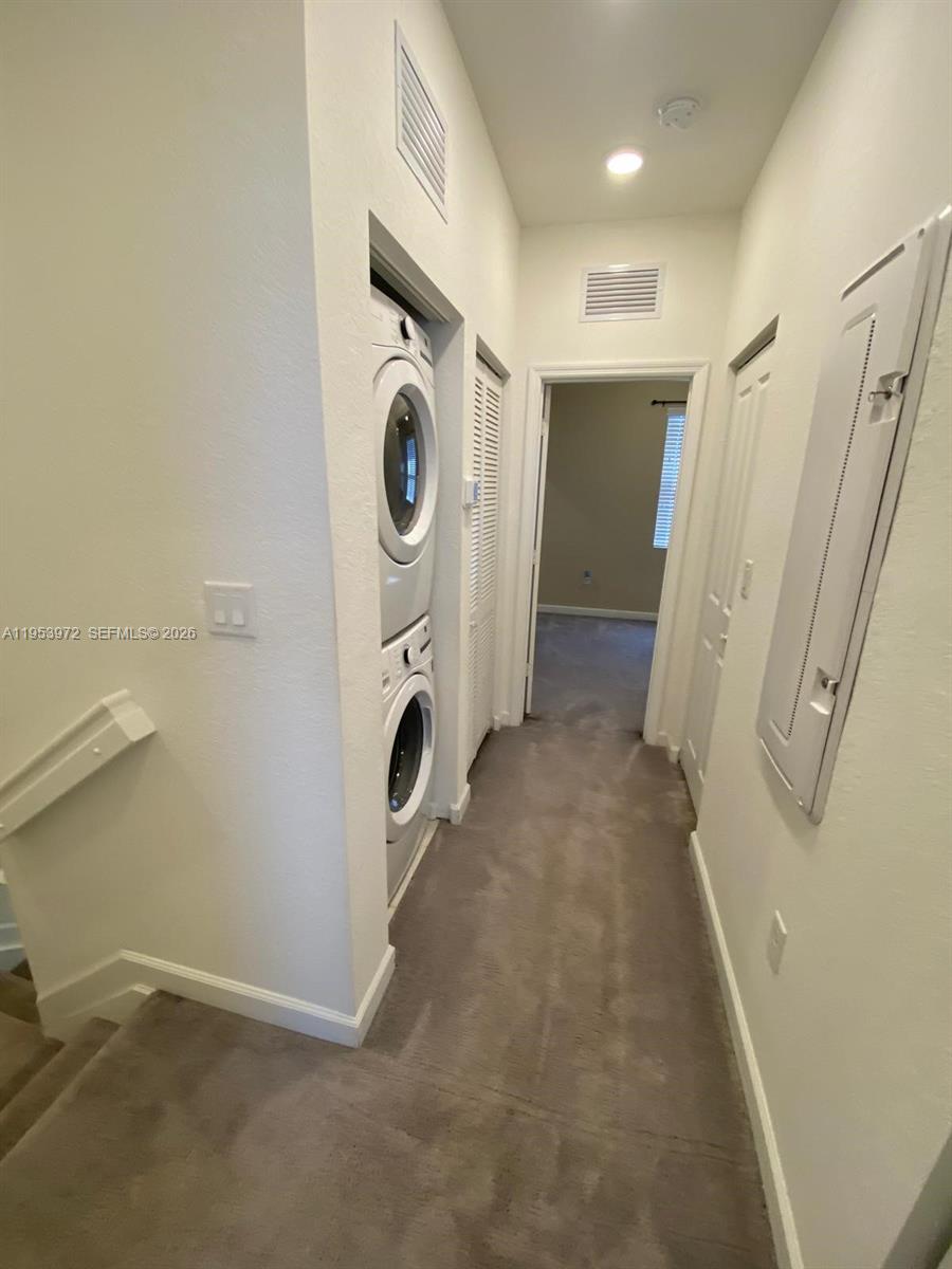 18220 Southwest 148th Road Miami, FL 33187 - Photo 9 of 23 a view of utility room with washer and dryer