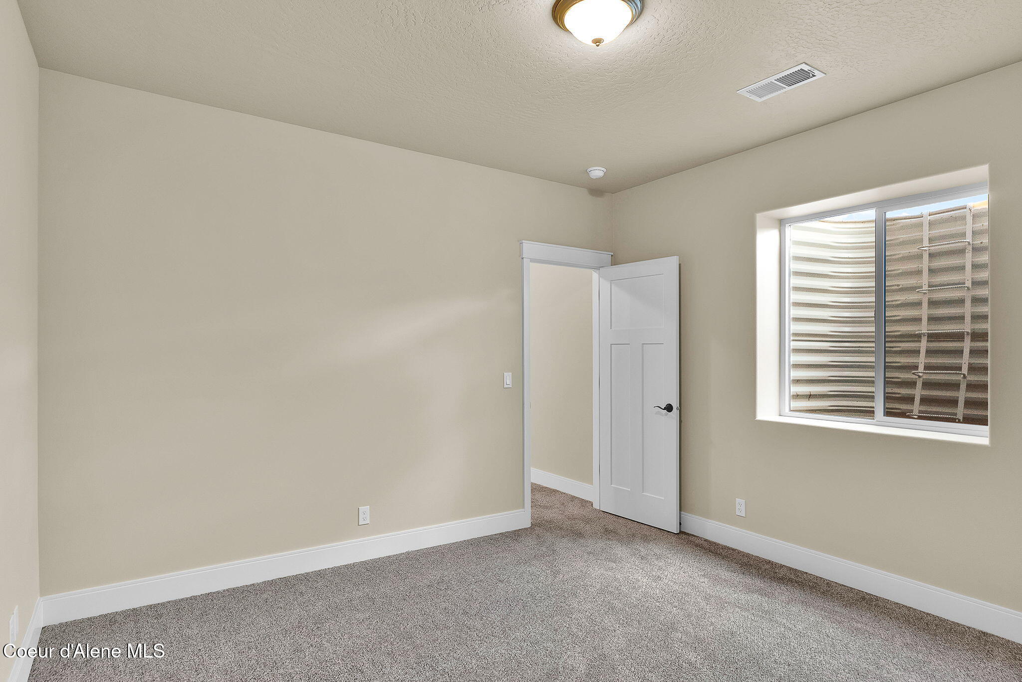 20668 North Bombastic Street Rathdrum, ID 83858 - Photo 37 of 48 Basement Bedroom 1