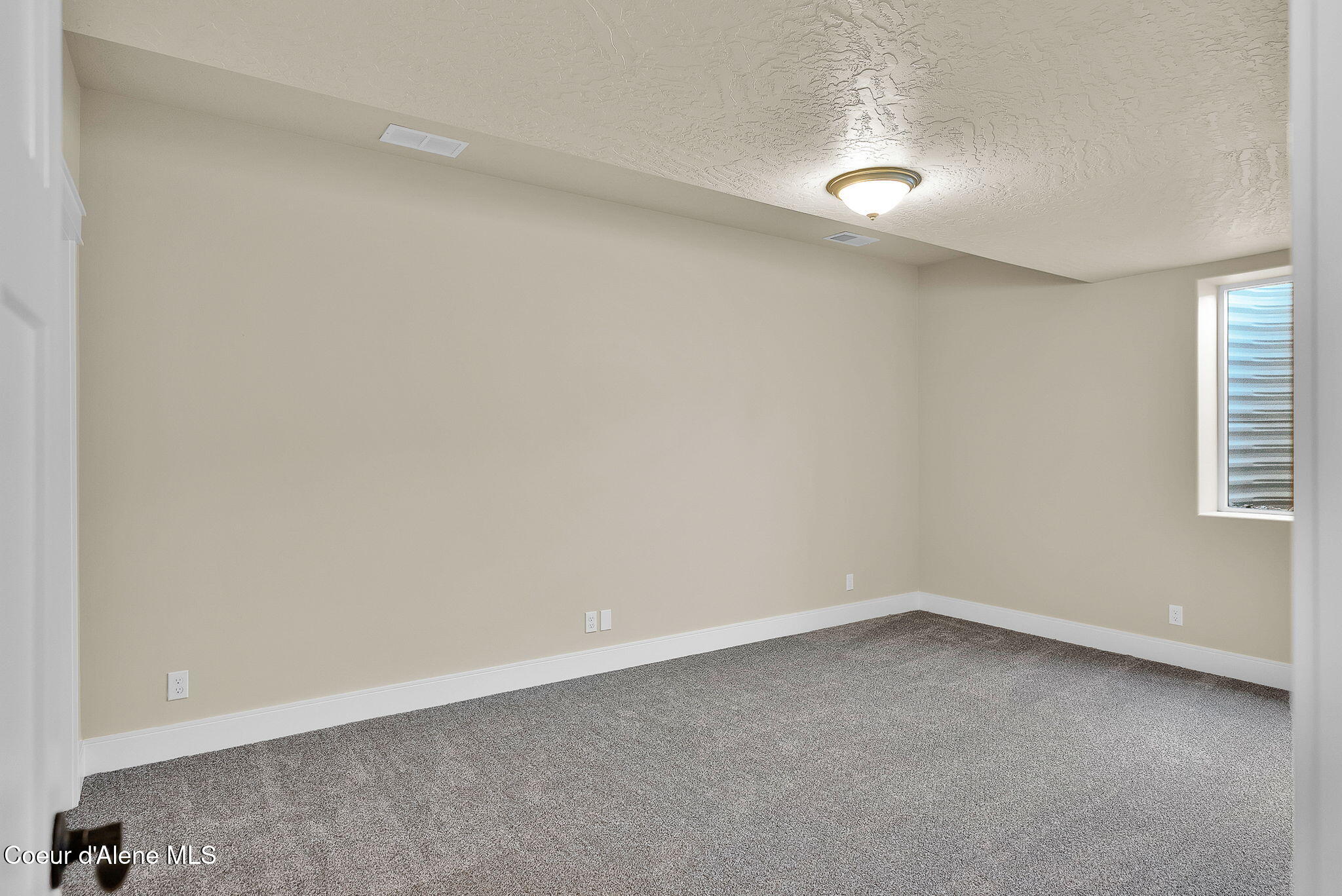 20668 North Bombastic Street Rathdrum, ID 83858 - Photo 40 of 48 Basement Bedroom 2