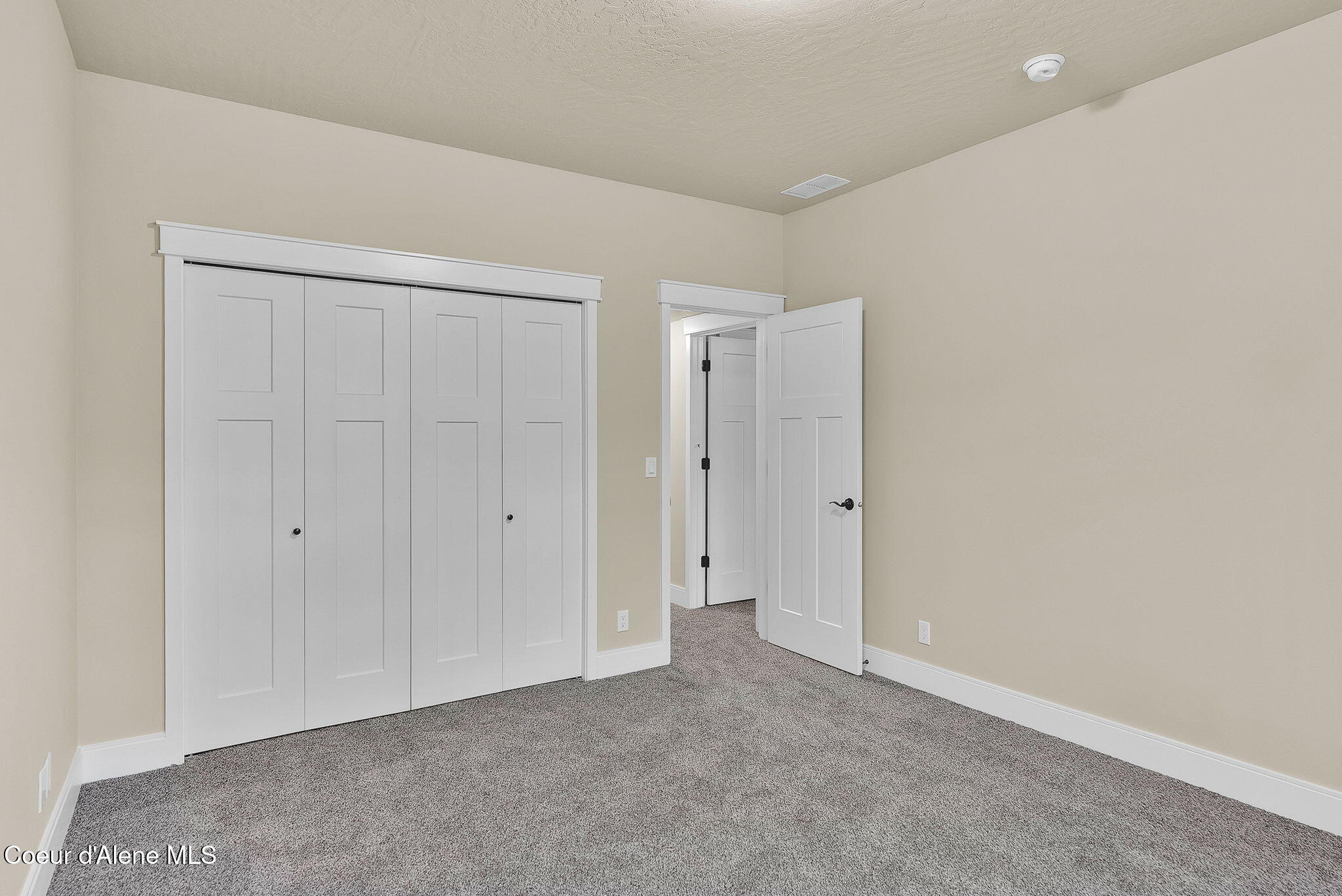 20668 North Bombastic Street Rathdrum, ID 83858 - Photo 43 of 48 Basement Bedroom 3