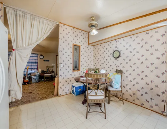 a view of a livingroom with patio and furniture
