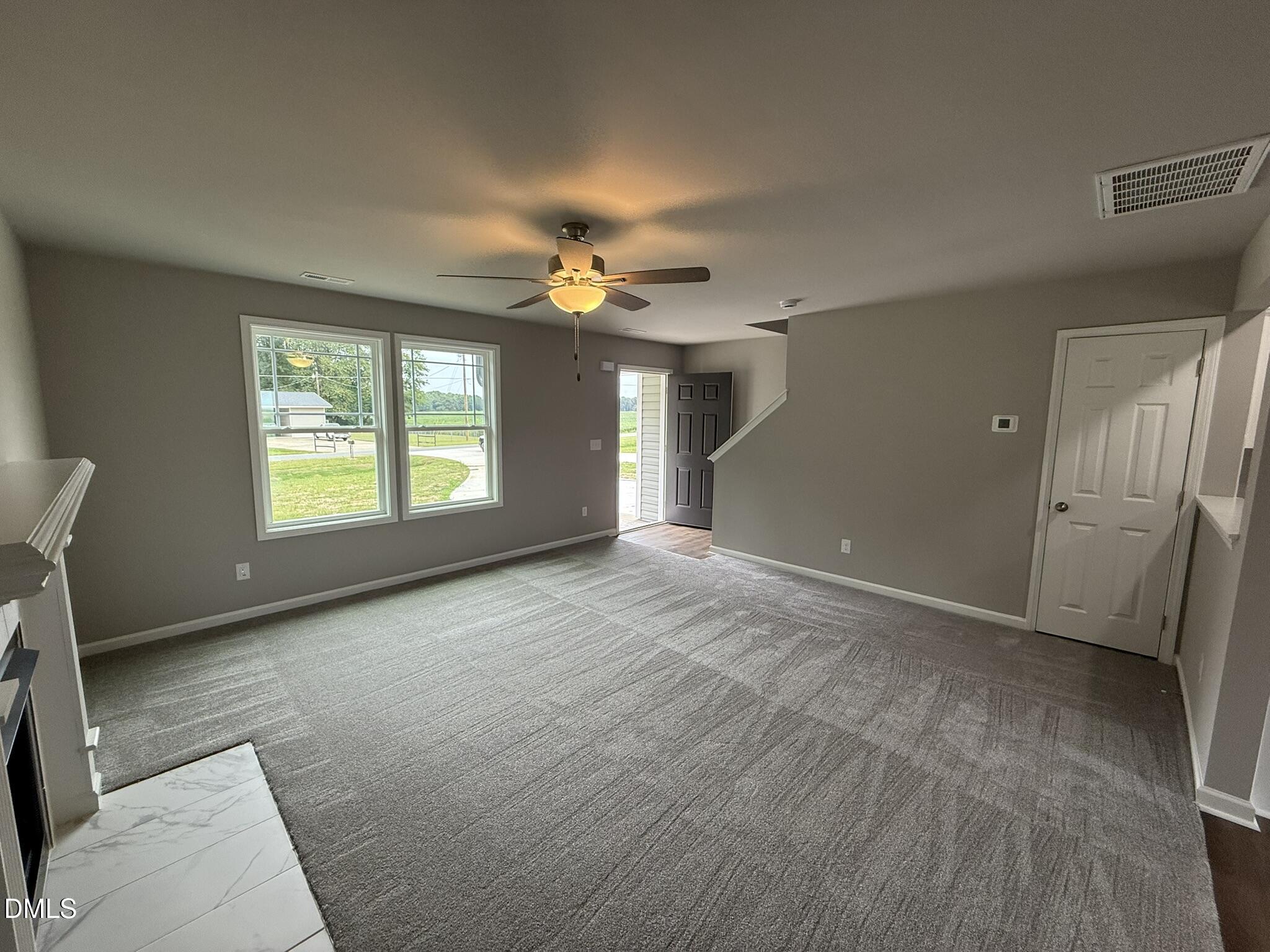 1859 Old Kenly Road Kenly, NC 27542 - Photo 6 of 22 a view of an empty room with a window
