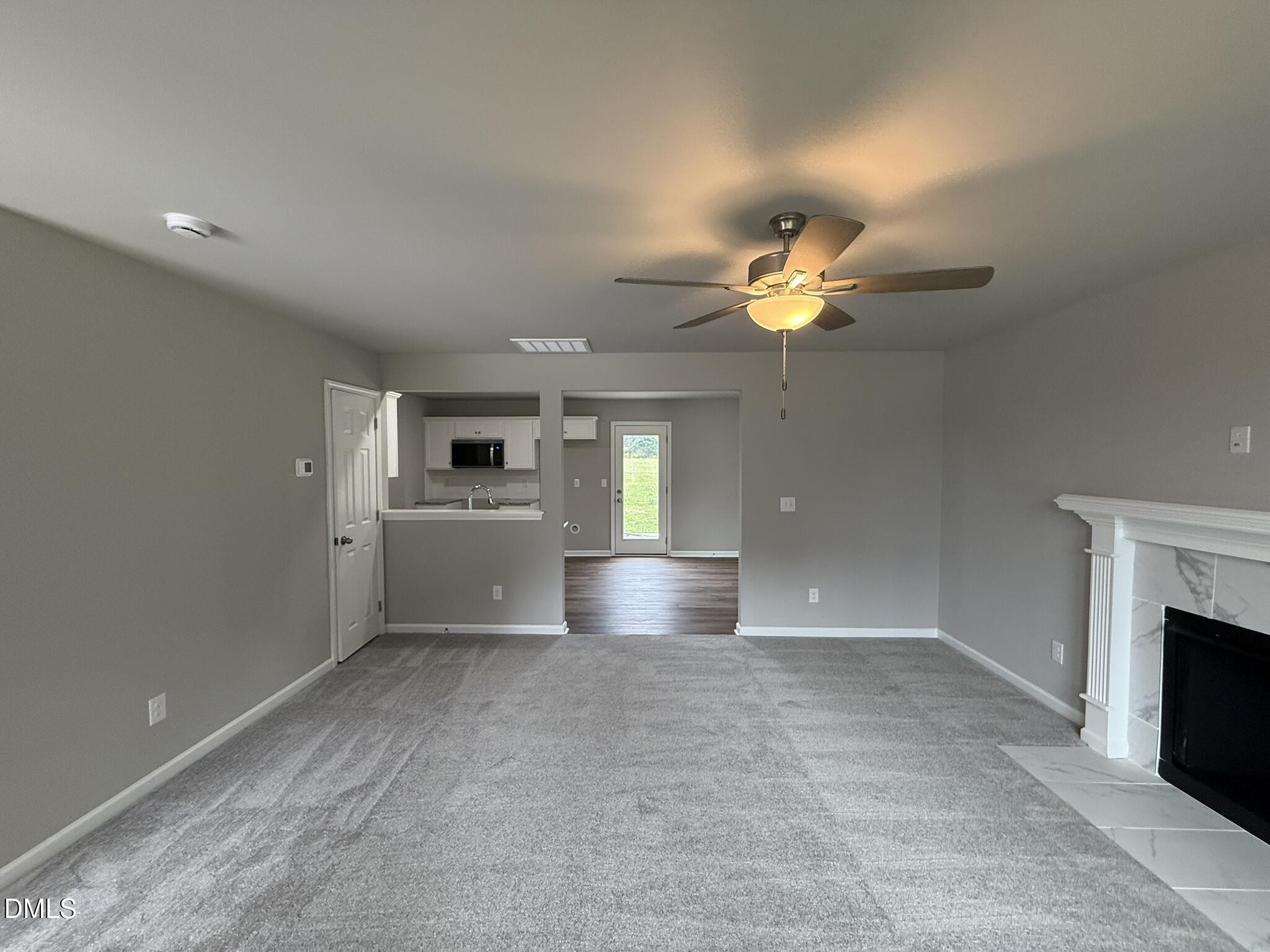 1859 Old Kenly Road Kenly, NC 27542 - Photo 8 of 22 a view of an empty room and fire place