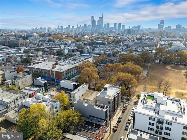 an aerial view of a city with lots of residential buildings