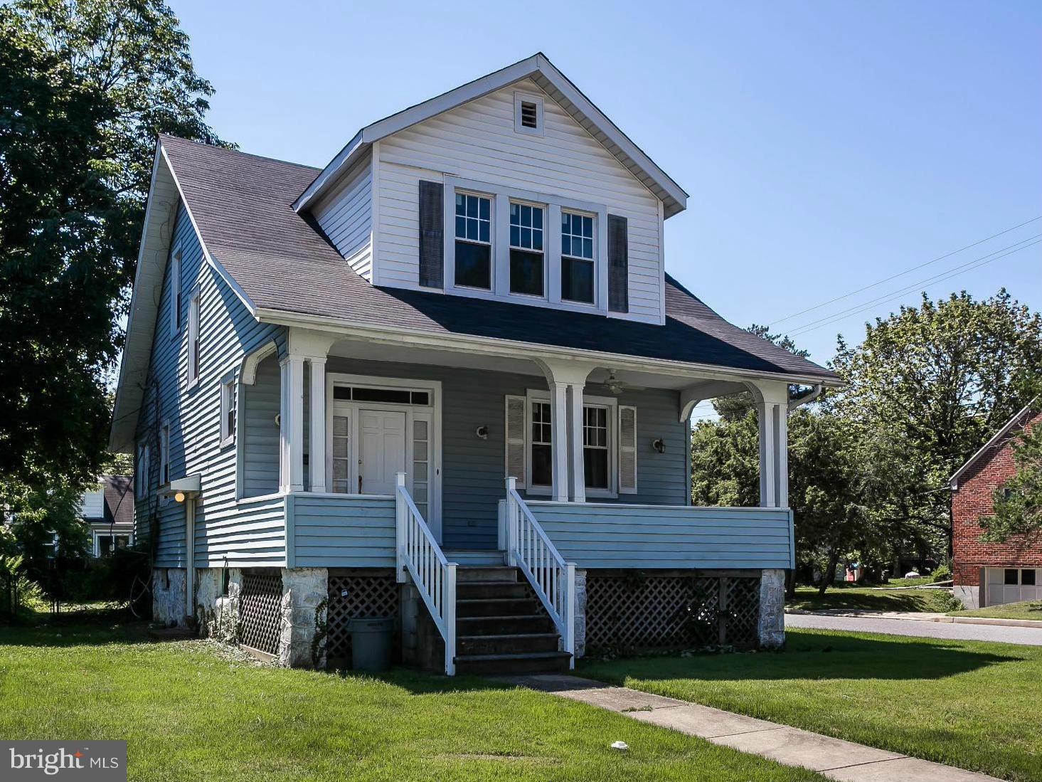 3229 Marnat Road Baltimore, MD 21208 - Photo 3 of 30 a front view of a house with a yard