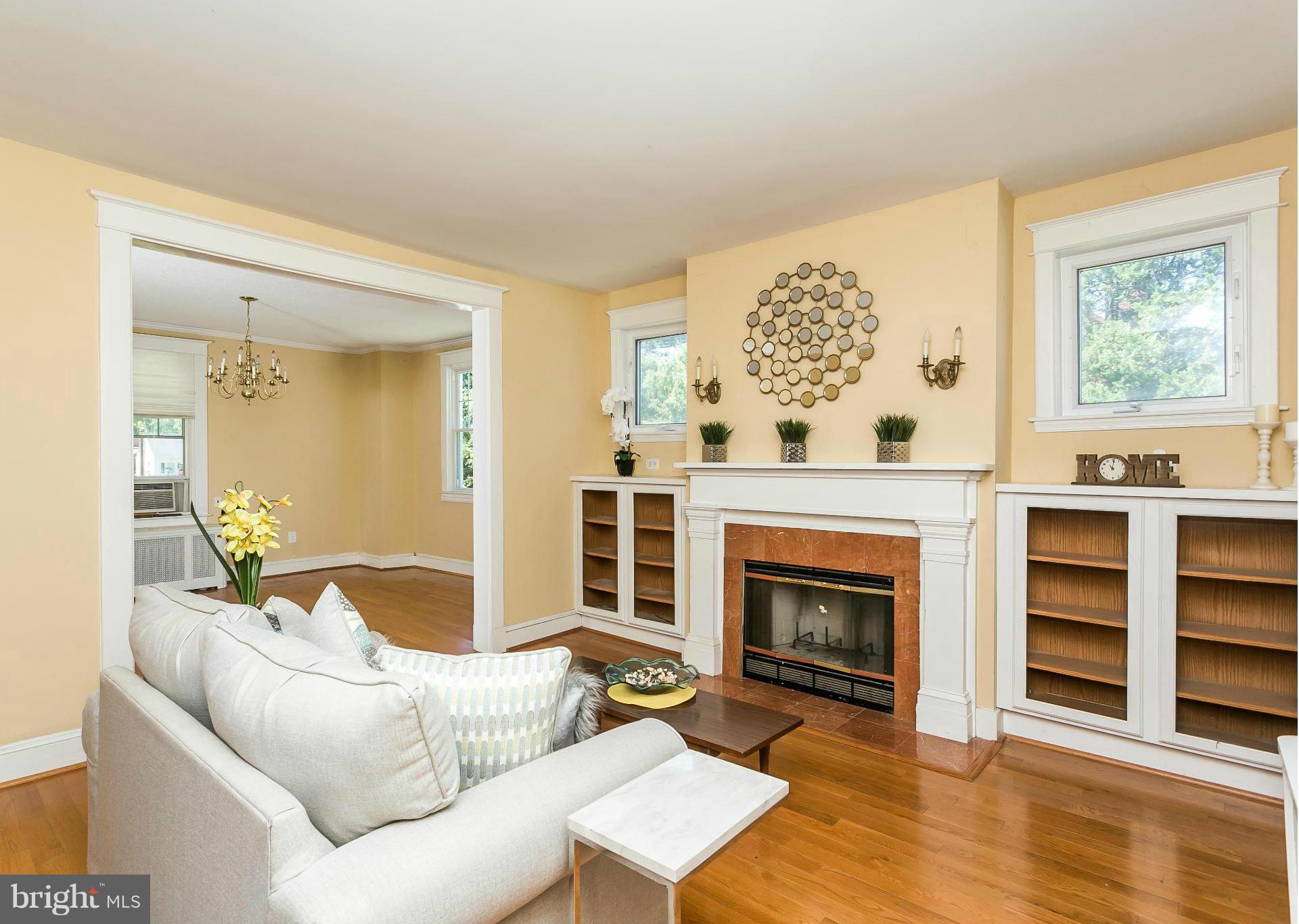 3229 Marnat Road Baltimore, MD 21208 - Photo 8 of 30 a living room with furniture and a fireplace