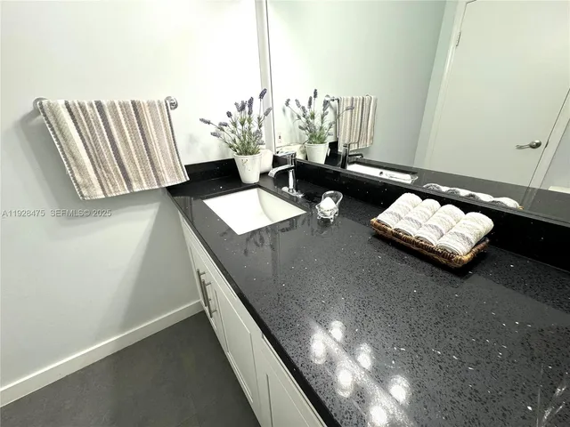 view of living room with furniture and floor to ceiling window