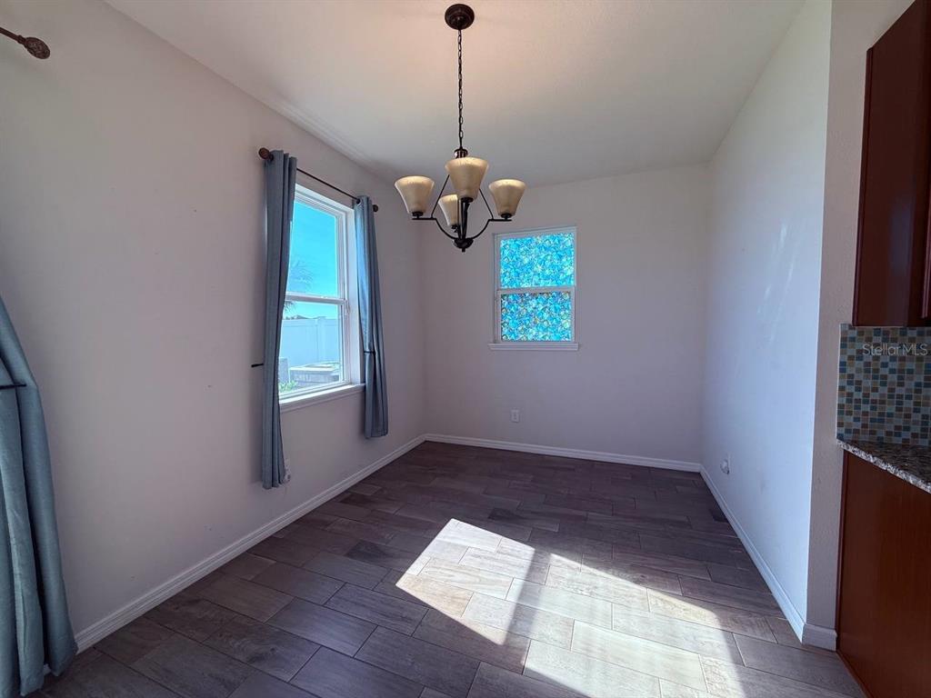 14112 Poke Ridge Drive Riverview, FL 33579 - Photo 9 of 32 a view of an empty room with a window