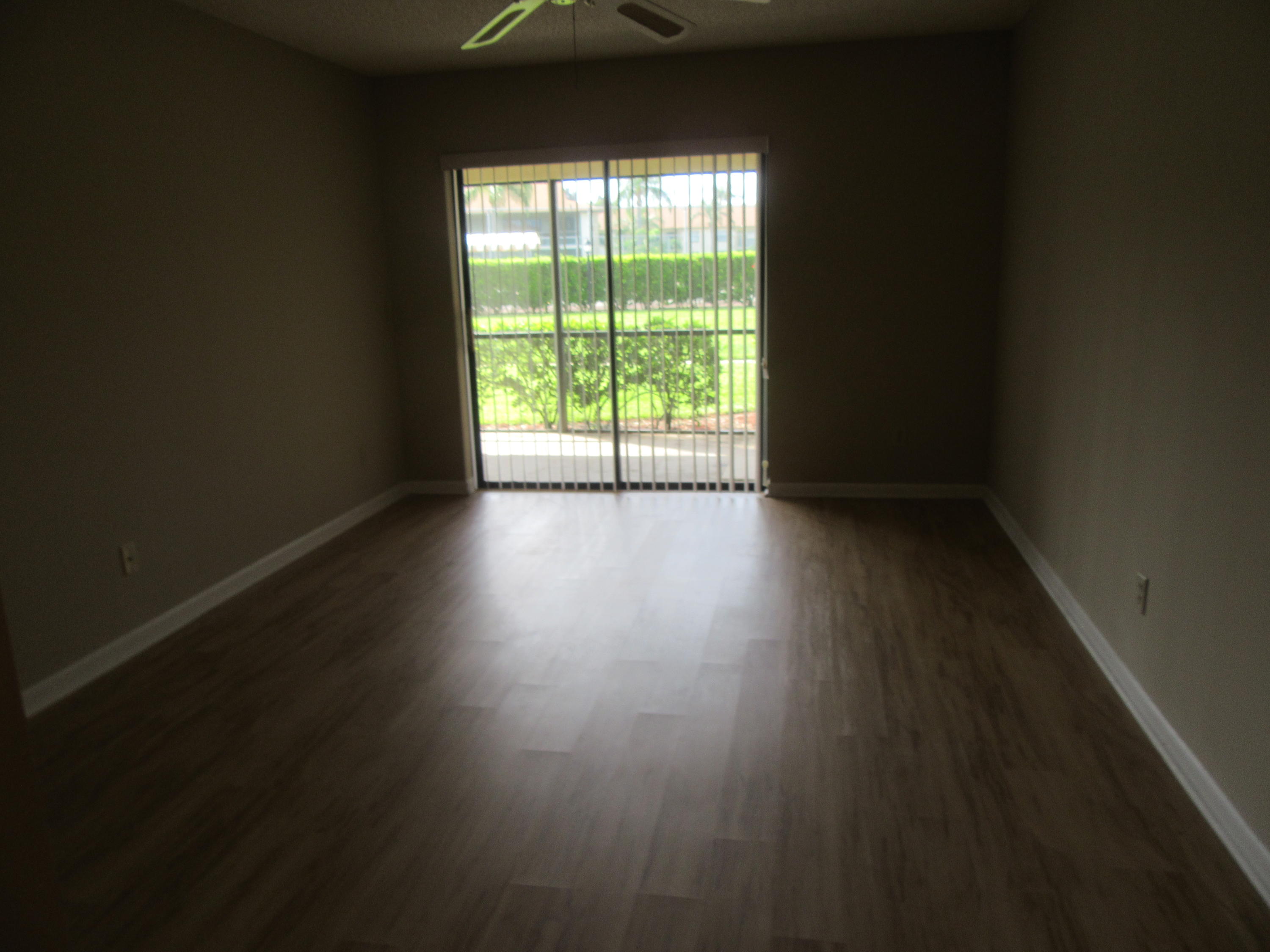 901 Pinecrest Circle, Unit D Jupiter, FL 33458 - Photo 11 of 24 Master bedroom