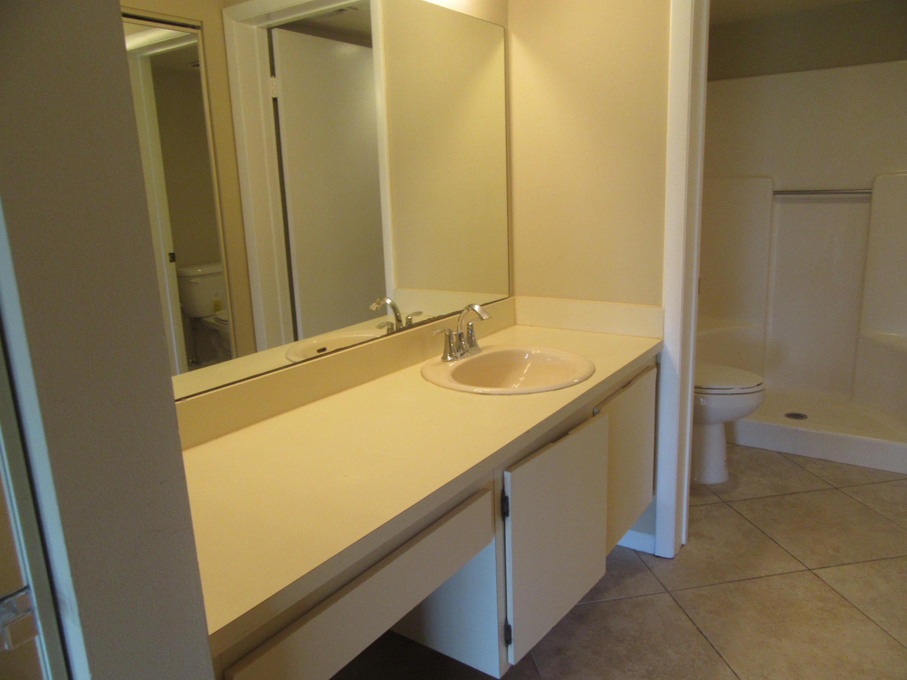 901 Pinecrest Circle, Unit D Jupiter, FL 33458 - Photo 12 of 24 Master bath