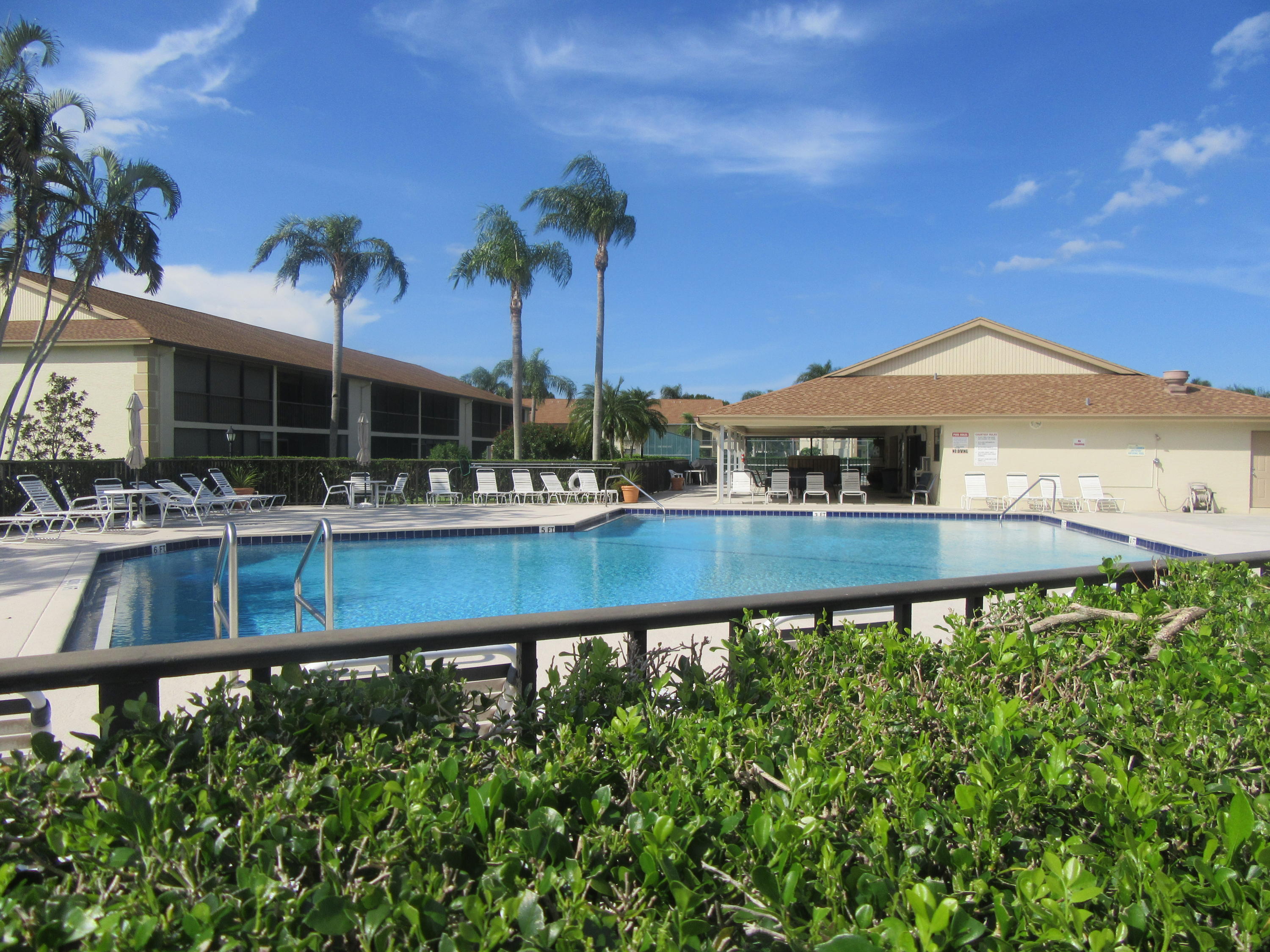 901 Pinecrest Circle, Unit D Jupiter, FL 33458 - Photo 16 of 24 Pinecrest pool