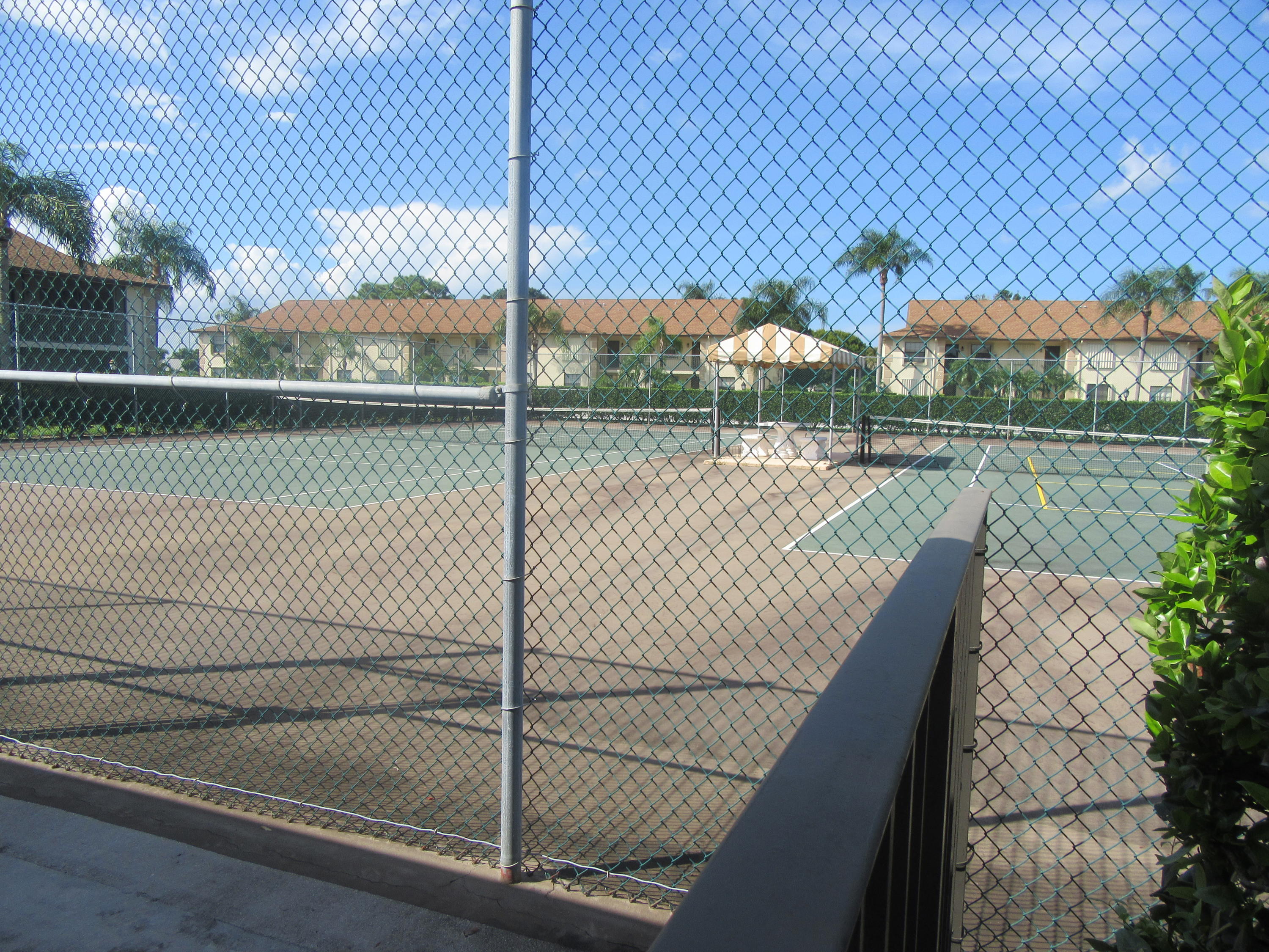 901 Pinecrest Circle, Unit D Jupiter, FL 33458 - Photo 18 of 24 Tennis courts