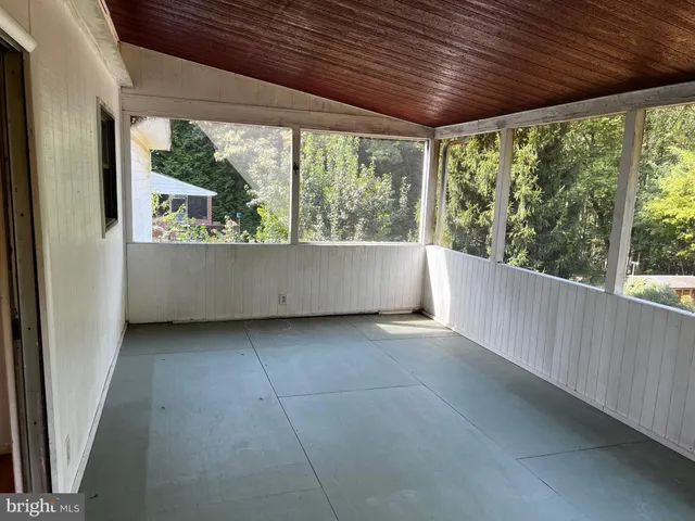 a view of backyard with green space