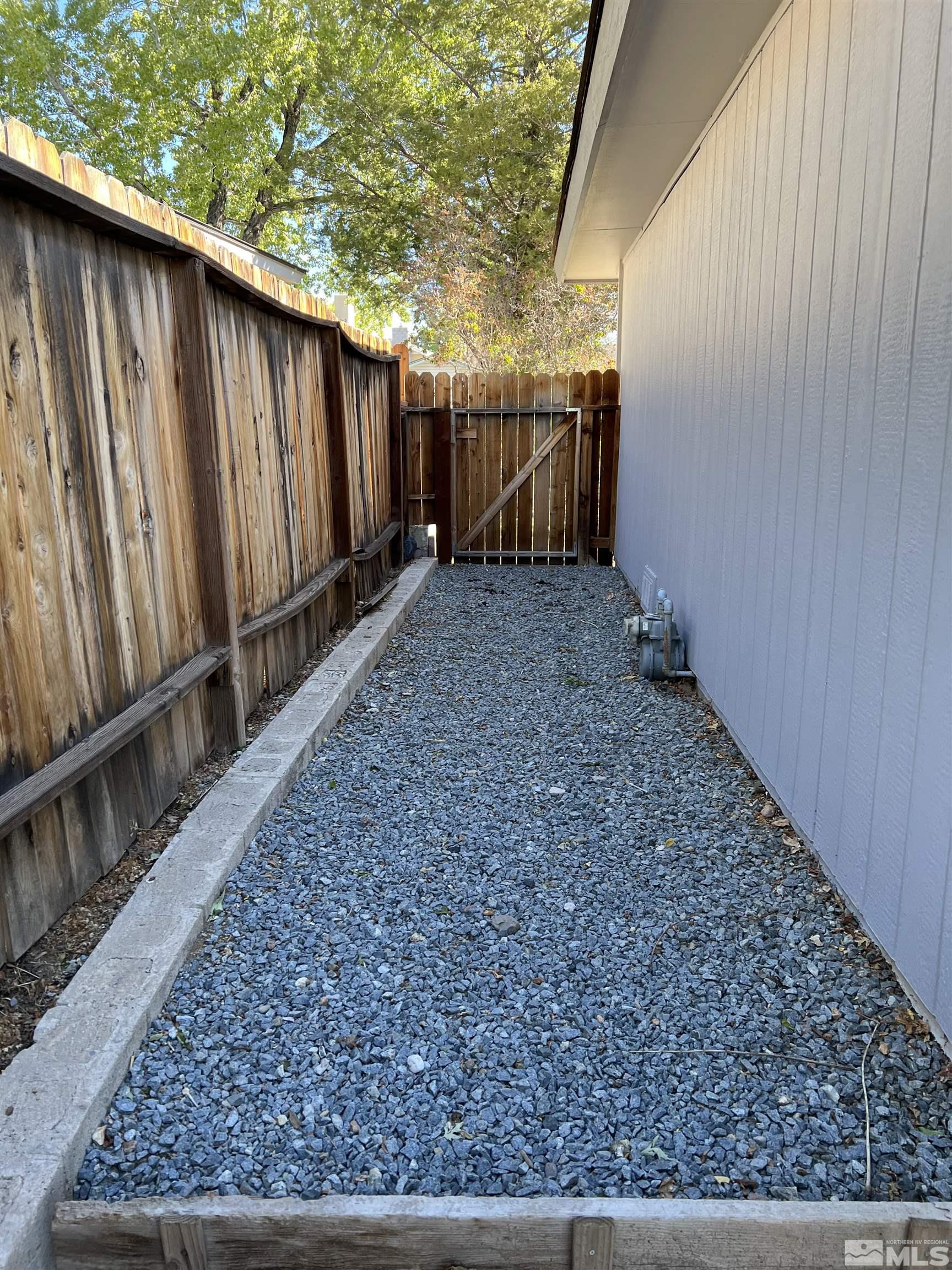 3515 Yosemite Place Reno, NV 89503 - Photo 5 of 23 a view of a backyard with pathway