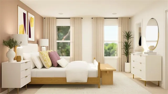 a bedroom with a bed and a large mirror