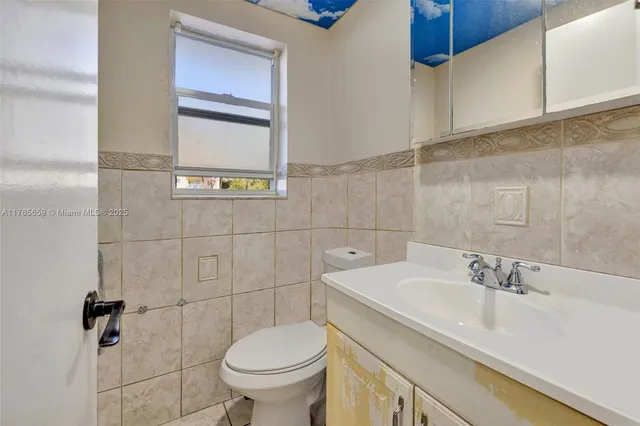 a view of a building with a yard