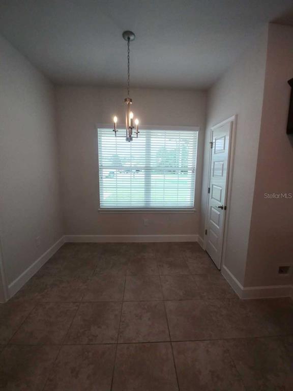 4380 Southwest 92nd Pl Road Ocala, FL 34476 - Photo 18 of 57 a view of an empty room with a window