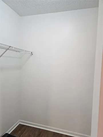 a view of small space with racks on the wall