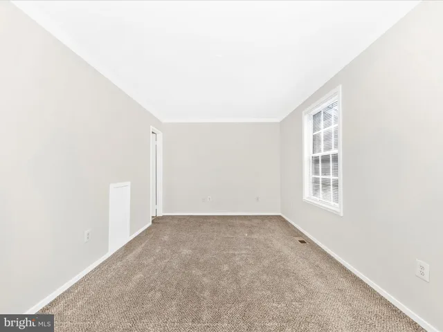 an empty room with closet