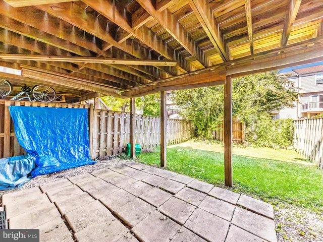 a view of a door with a wooden deck