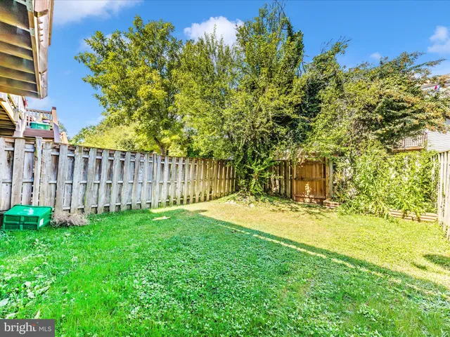 a view of balcony with wooden floor