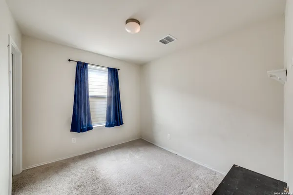 an empty room with window